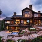 Cozy cottage in forest clearing at dusk with glowing windows