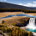 Vibrant landscape: waterfall, steam, turquoise pool, autumn trees