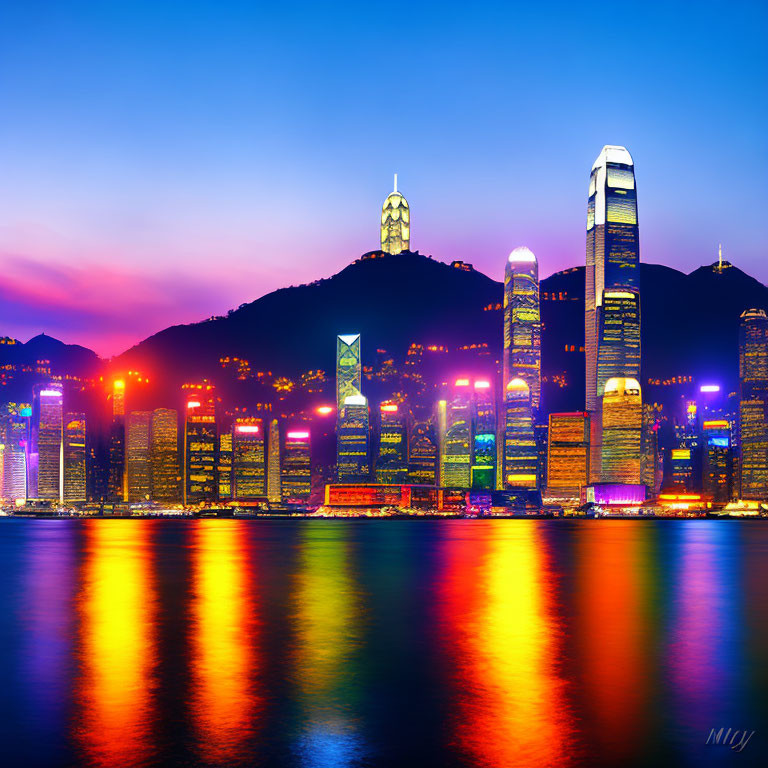 Modern city skyline at twilight with illuminated skyscrapers against a purple sky reflected on water.