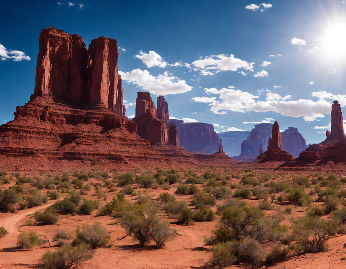 Vast desert landscape with towering red rock formations