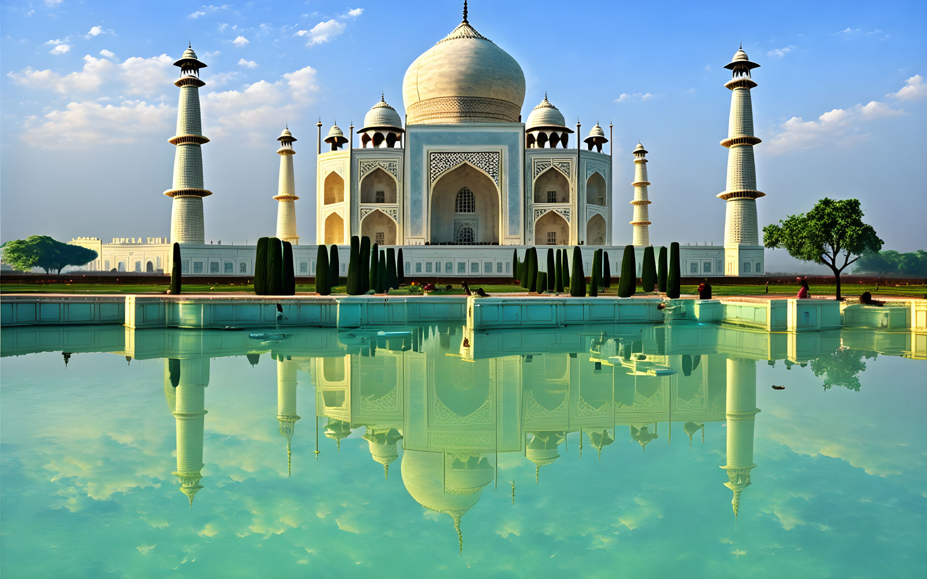 Ivory-White Marble Taj Mahal Reflects Symmetrically in Water