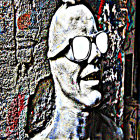 Stylized portrait with glitch art effects: person with glasses, high pompadour, surrounded by