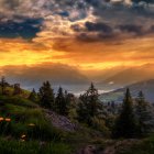 Colorful mountain landscape with dual sunsets at twilight