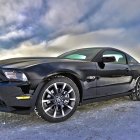 Ornately Designed Futuristic Vehicle in Snowy Landscape