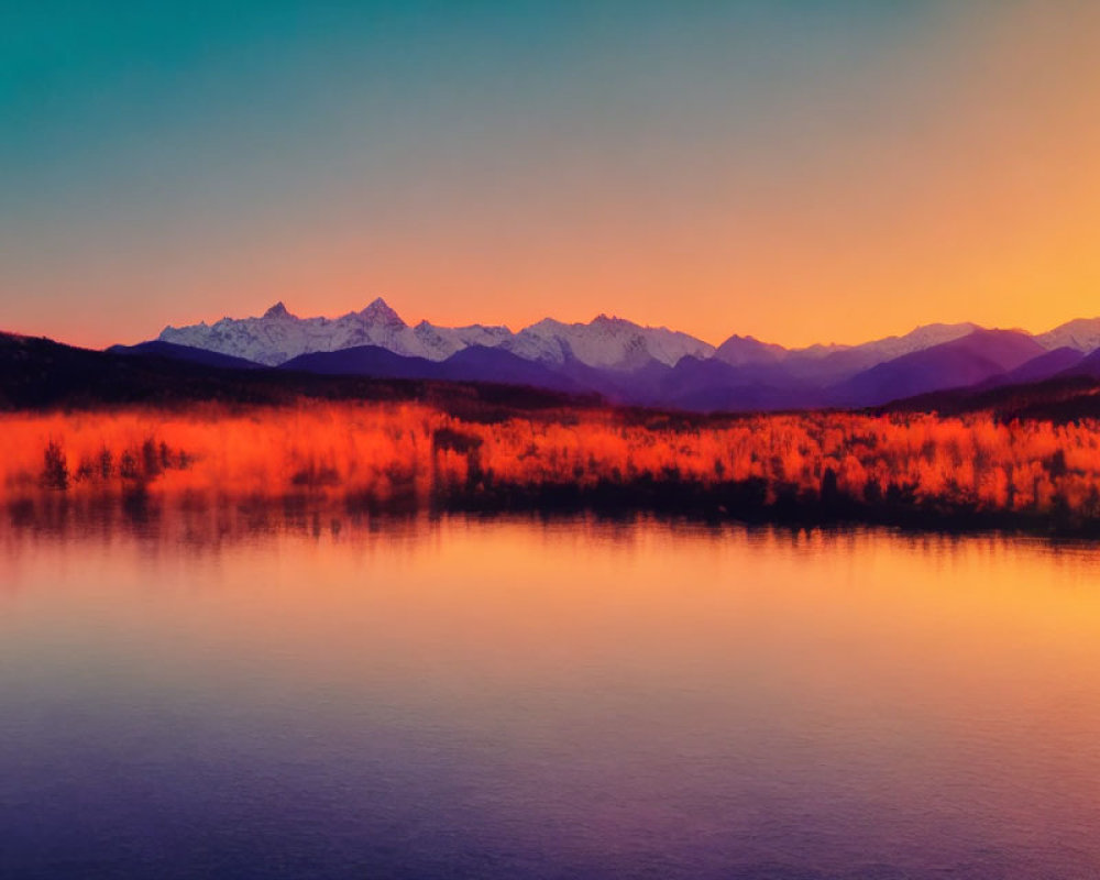 Tranquil lake sunset with mountain and forest silhouettes