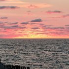 Colorful Sunset Seascape with Gentle Waves