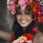 Woman Portrait Surrounded by Pink and Orange Flowers