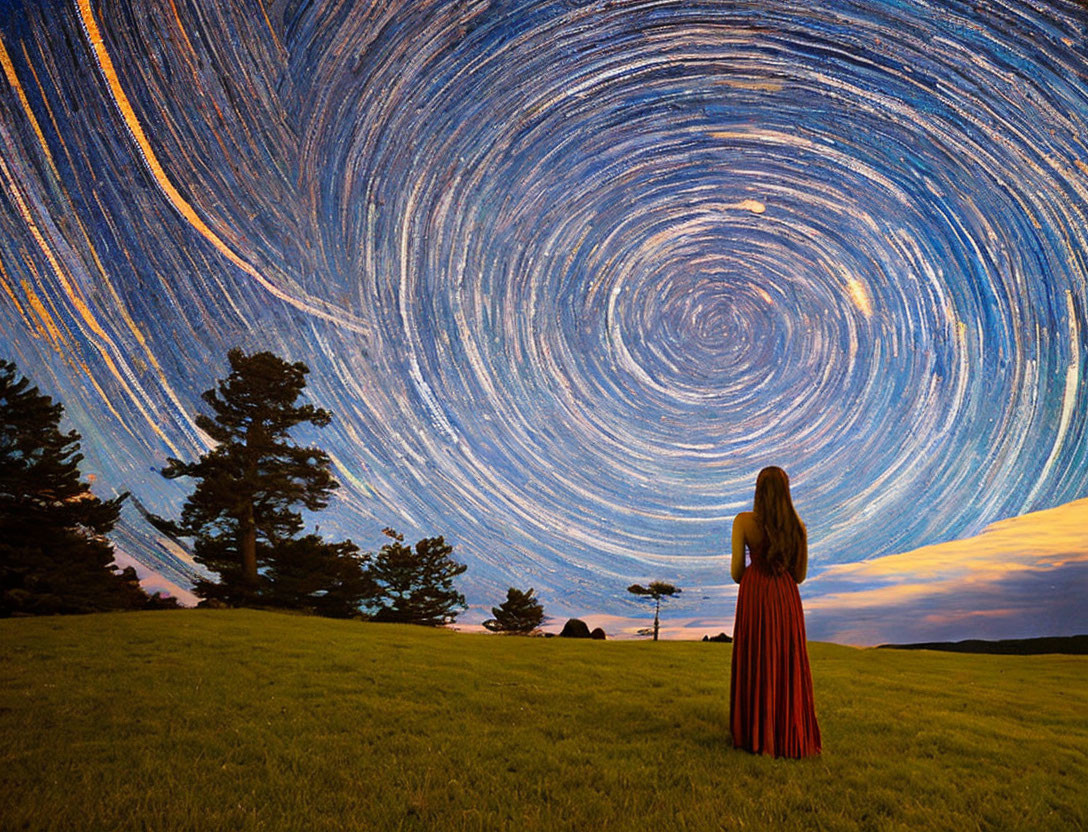 Person in Red Dress Stargazing Under Star Trails