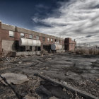 Desolate post-apocalyptic landscape with damaged buildings