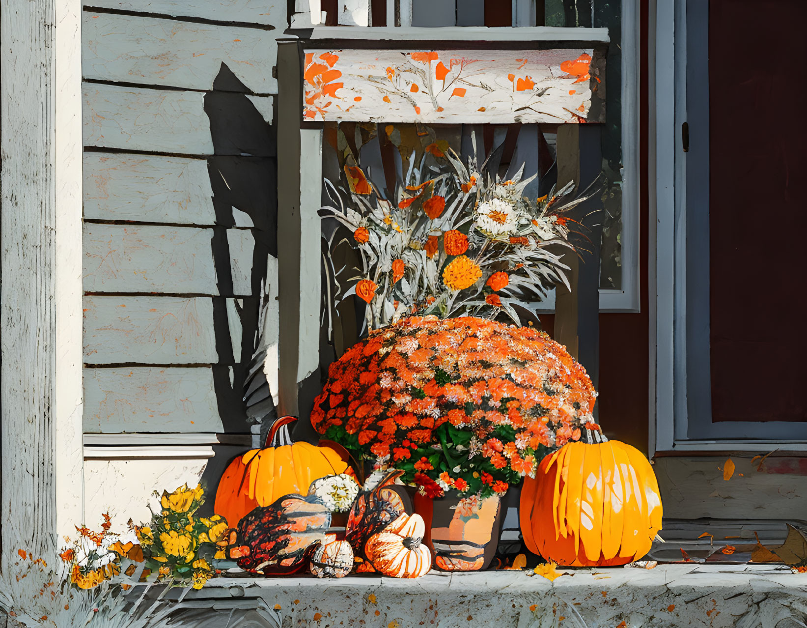 Fall-themed porch with pumpkins, chrysanthemums, and autumn leaves