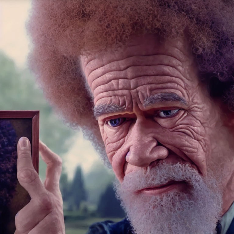 Elderly man with afro examining picture in nature setting