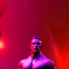 Muscular Figure in Intense Gaze Amid Red and Purple Light