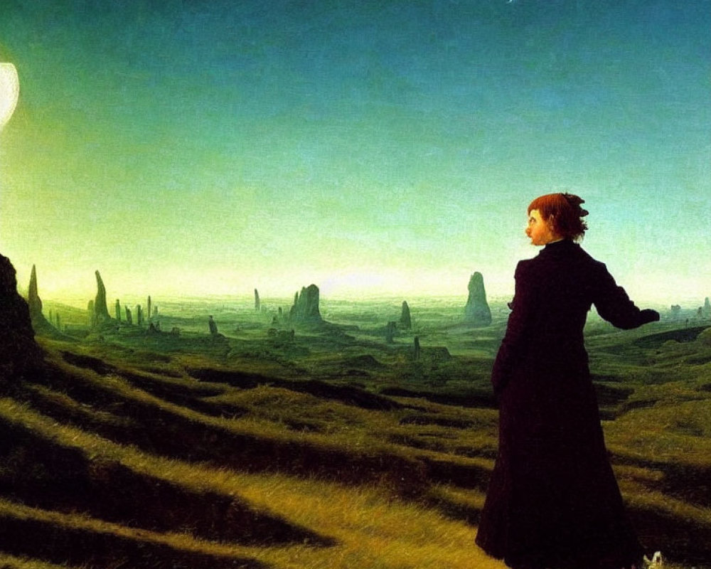 Woman in dark dress with dog on grassy knoll at twilight landscape.