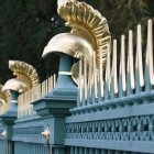 Ornate crescent-shaped structures with swirling galaxies under a starry sky