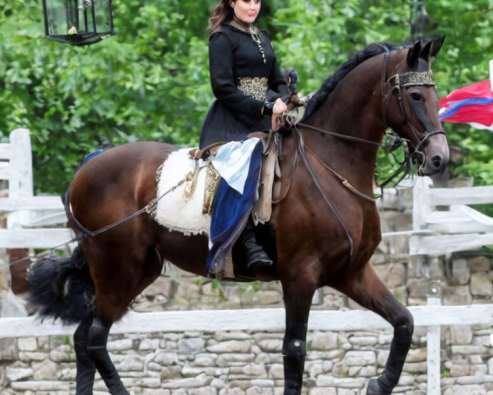 Traditional attired woman riding horse with blue and white flag, rustic background.