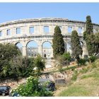 Historical amphitheater with stone arches in watercolor art