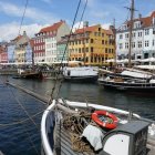 Colorful European Town Canal Illustration with Boats and Houses