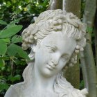 White Marble Bust of Woman with Golden Accents