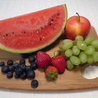 Purple Flowers, Brass Bowl, Fruit, and Lemon in Still Life Painting