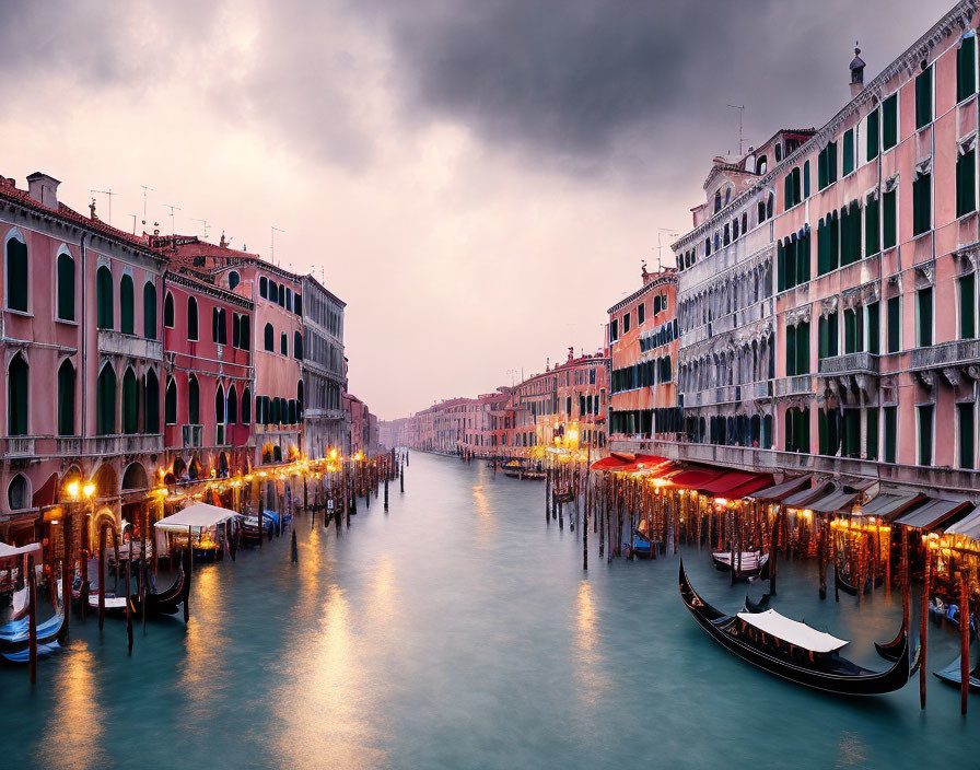 Historic buildings and gondolas at Venice's Grand Canal at twilight