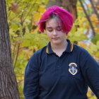 Person with Short Purple Hair in Blue Hoodie in Fantastical Forest