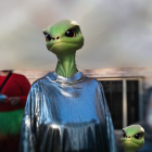 Detailed illustration of green alien creatures in silver robes