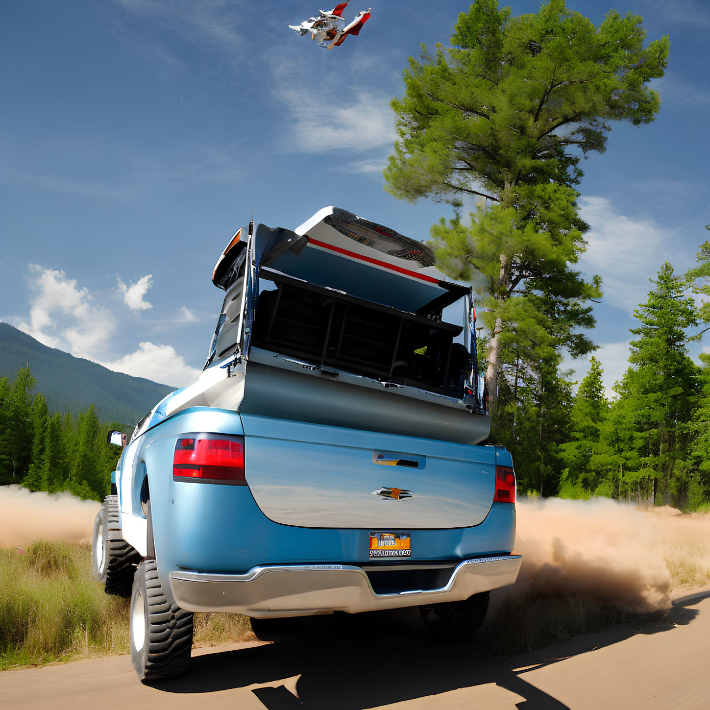 Chevrolet SUV speeding on dirt road with helicopter above