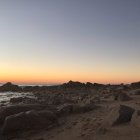 Picturesque medieval village at sunset by the calm sea