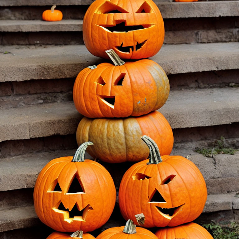 Carved Jack-o'-Lantern Tower on Outdoor Steps