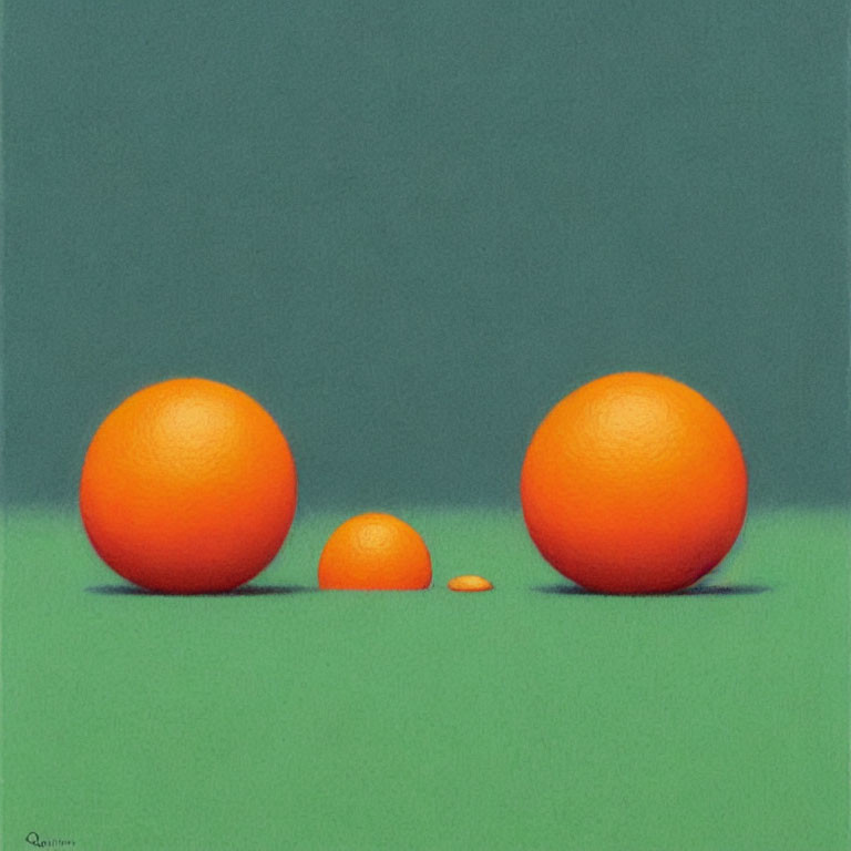 Three Oranges Arranged on Green Background