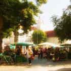 Traditional Dress Shoppers at Vibrant Outdoor Market