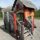 Illustration of Whimsical Storybook Cottage with Curved Roof