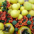 Colorful Fruit Composition Featuring Yellow Melons, Red Berries, and Green Leaves