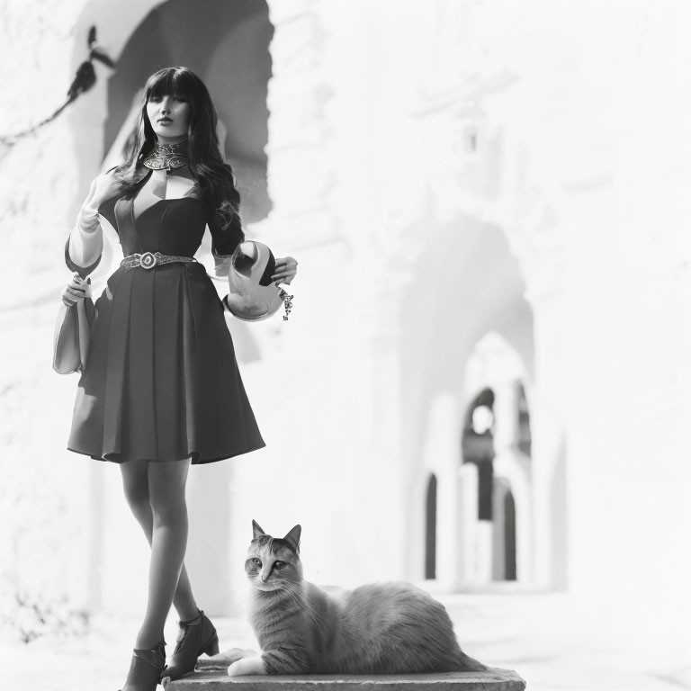 Monochrome image featuring stylish woman, cat, and arched corridor