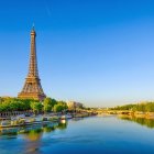 Colorful Eiffel Tower painting by the Seine River in Paris