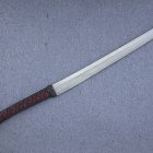 Patterned Blade Antique Sword with Leather-Wrapped Hilt on Grey Background