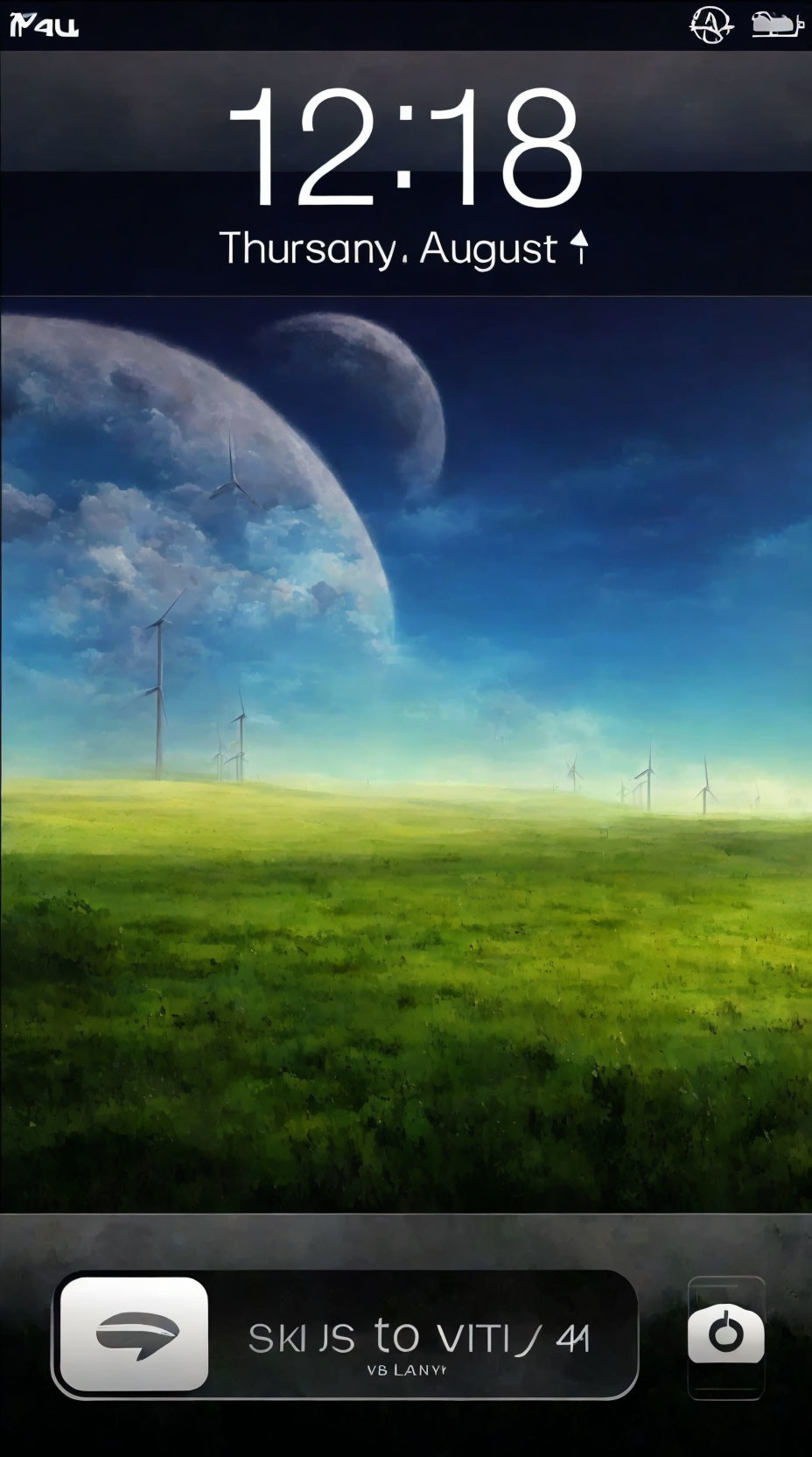 Mobile phone lock screen with time, date, grassy landscape, wind turbines, and large moon.