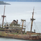 Multiple Rusty Shipwrecks in Shallow Waters