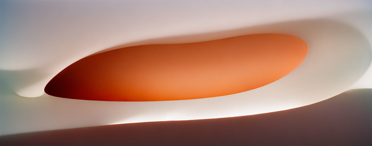 Elongated oval shape with white to warm orange gradient