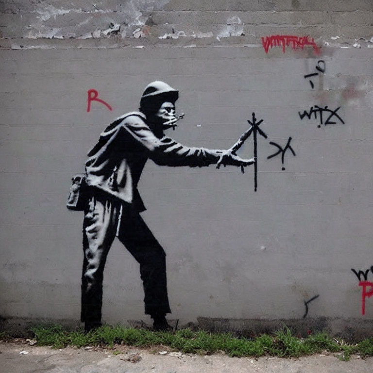 Monochrome graffiti art featuring person painting star with tags