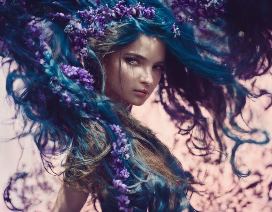 Young woman with blue-tinted hair and purple flowers in dreamlike setting