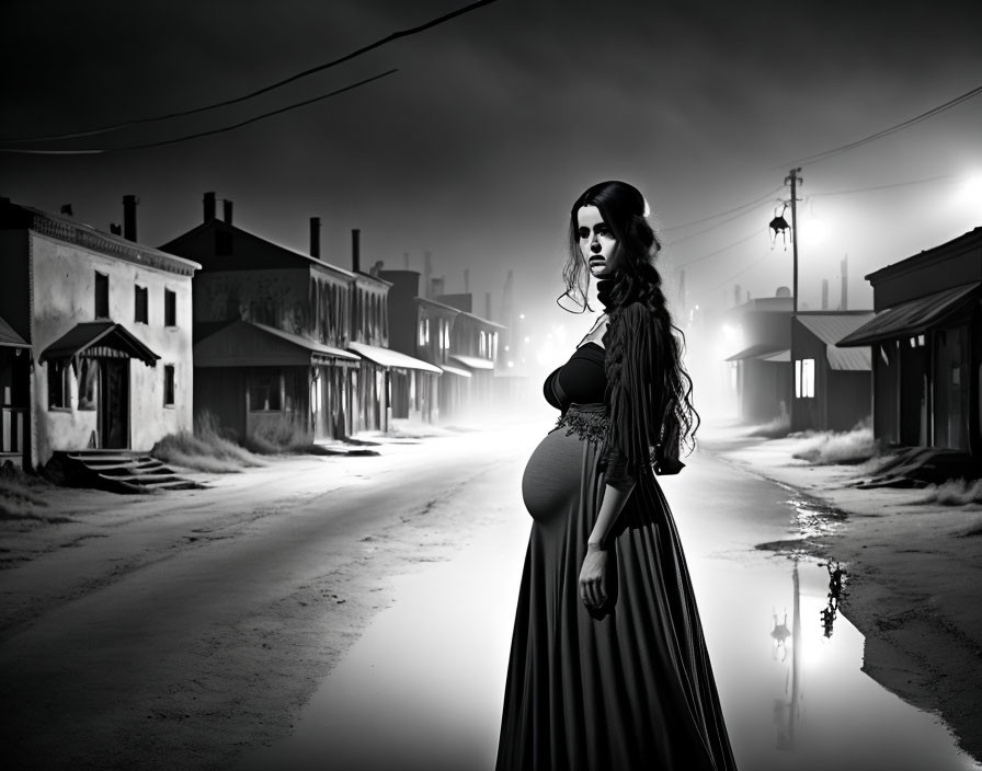 Pregnant woman in black dress on deserted night street