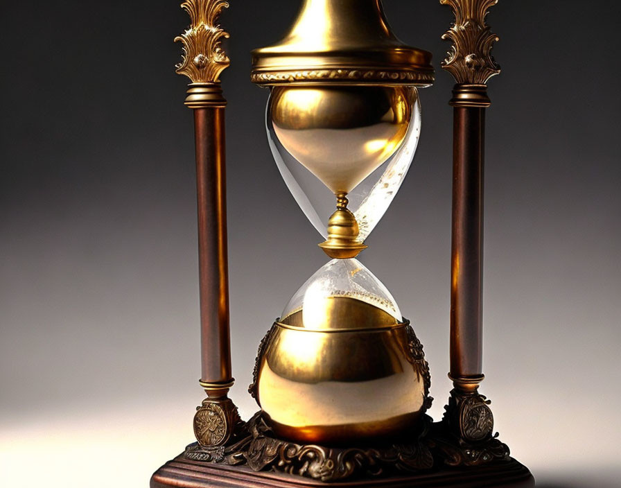 Golden-framed ornate hourglass on wooden base with translucent sand, gradient background