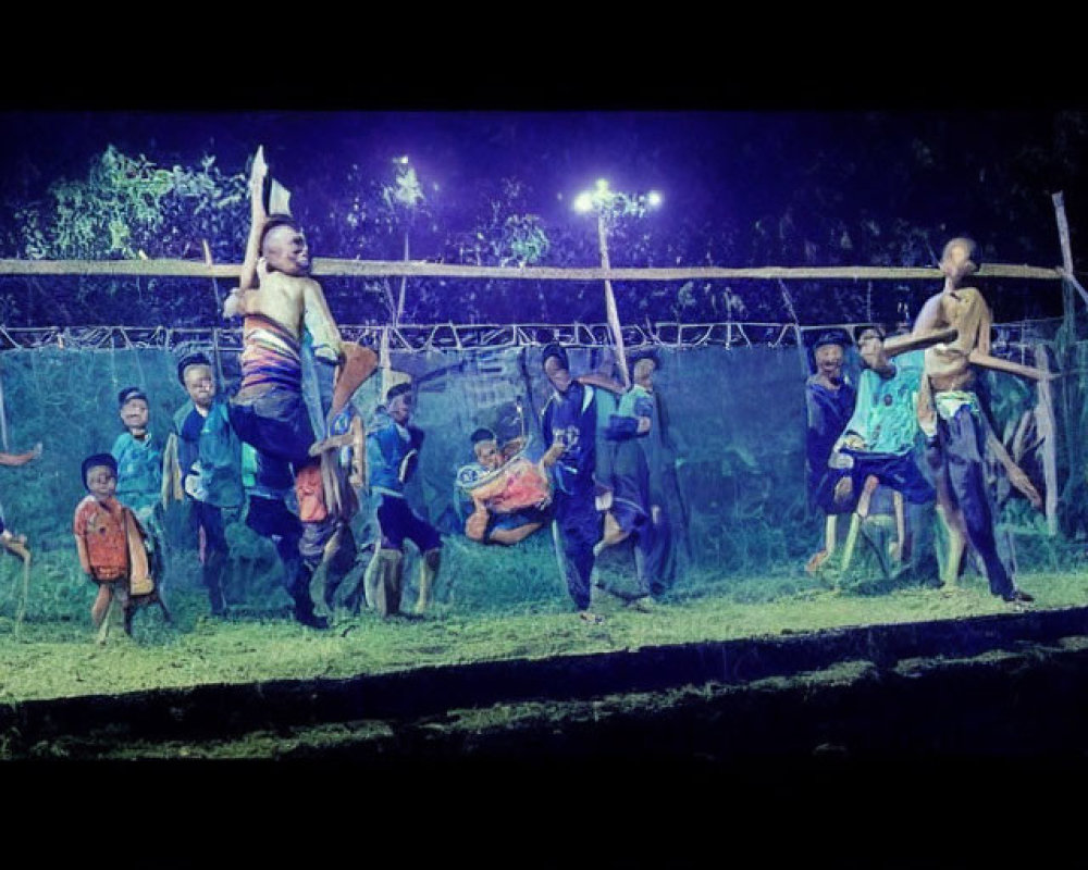 Nighttime tug-of-war under bright lights in grassy outdoor area