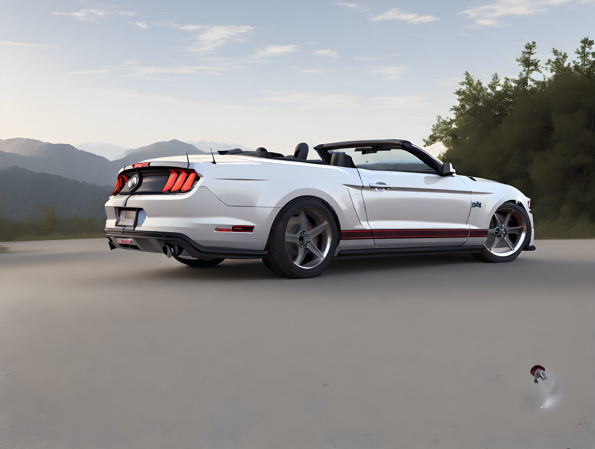 Convertible sports car parked with mountains in background.