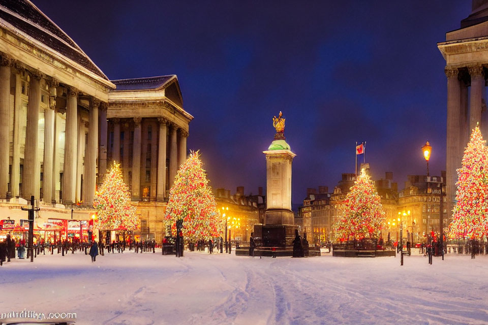 Snow-covered square with Christmas trees, statue, and classical buildings at twilight