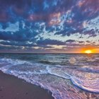 Serene sunset ocean watercolor with vibrant colors