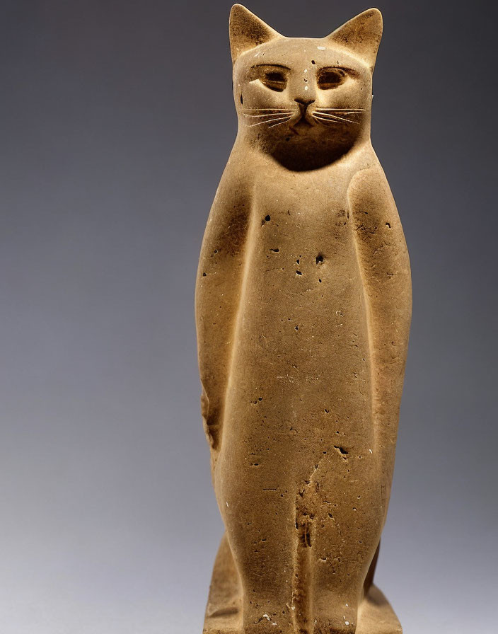 Anthropomorphic Cat Sculpture with Feline Head in Textured Stone