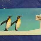 Illustrated penguins in snowy landscape with birdcage and falling snowflakes