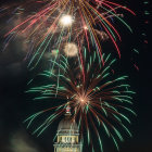 Colorful fireworks illuminate night sky above domed building